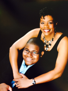 A professional photograph of Vera Jones and her son.
