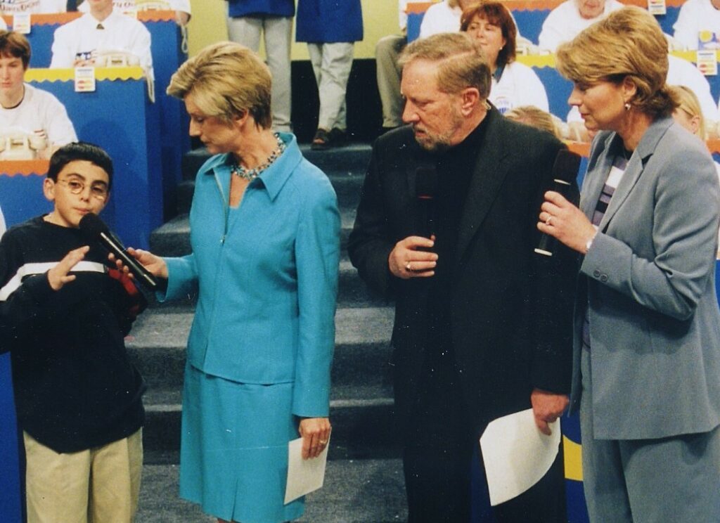 Cole being interviewed at a telethon.