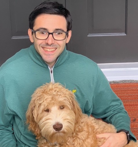 Cole Hardman with his dog.