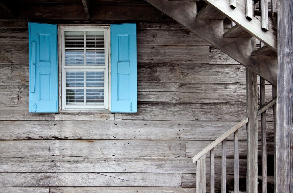 Window with blue shutters